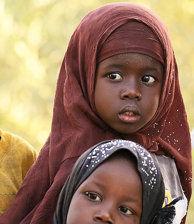 At Ndianda, village in the bush (dans un village de brousse)