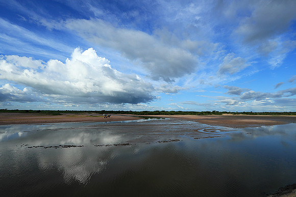 Clouds and reflections in the lagoon